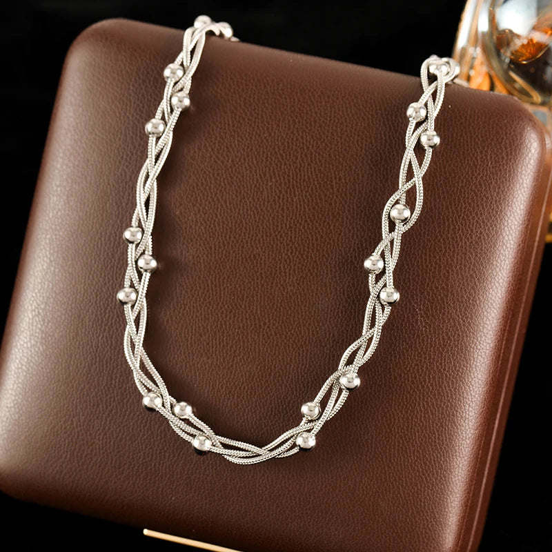 Conjunto Colar e Pulseira Entrelaçada Banhado em Ouro 18K